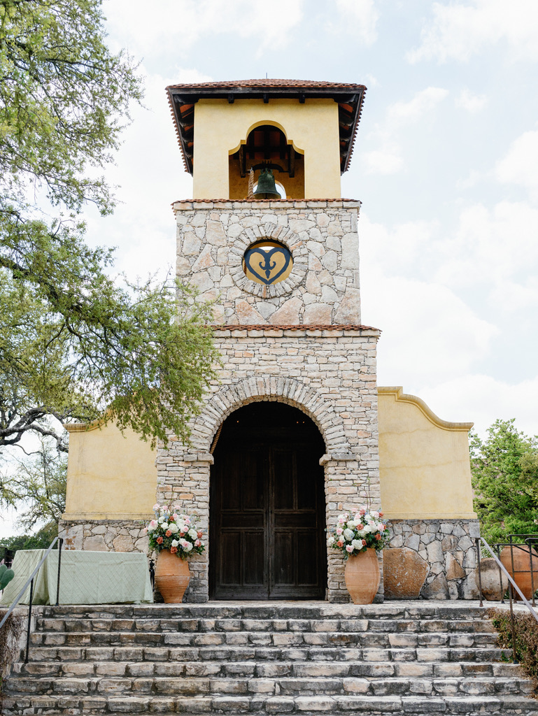 Stone chapel at Camp Lucy, a Central Texas wedding venue known for Hill Country charm.