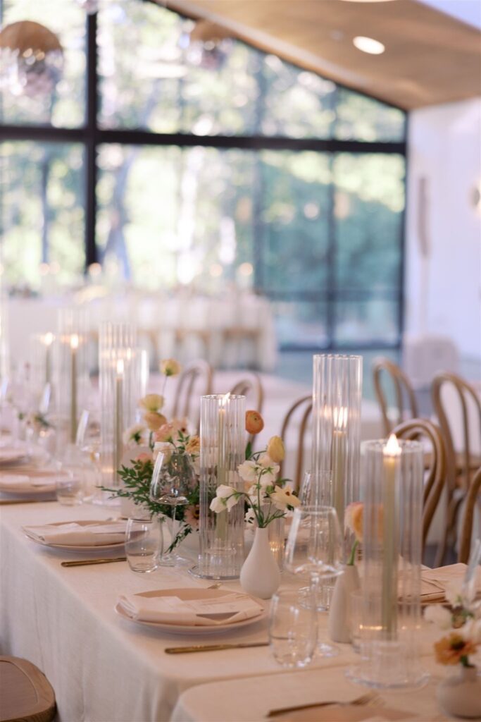 Elegant reception table setup at The Grand Lady, a modern Central Texas wedding venue with natural light.