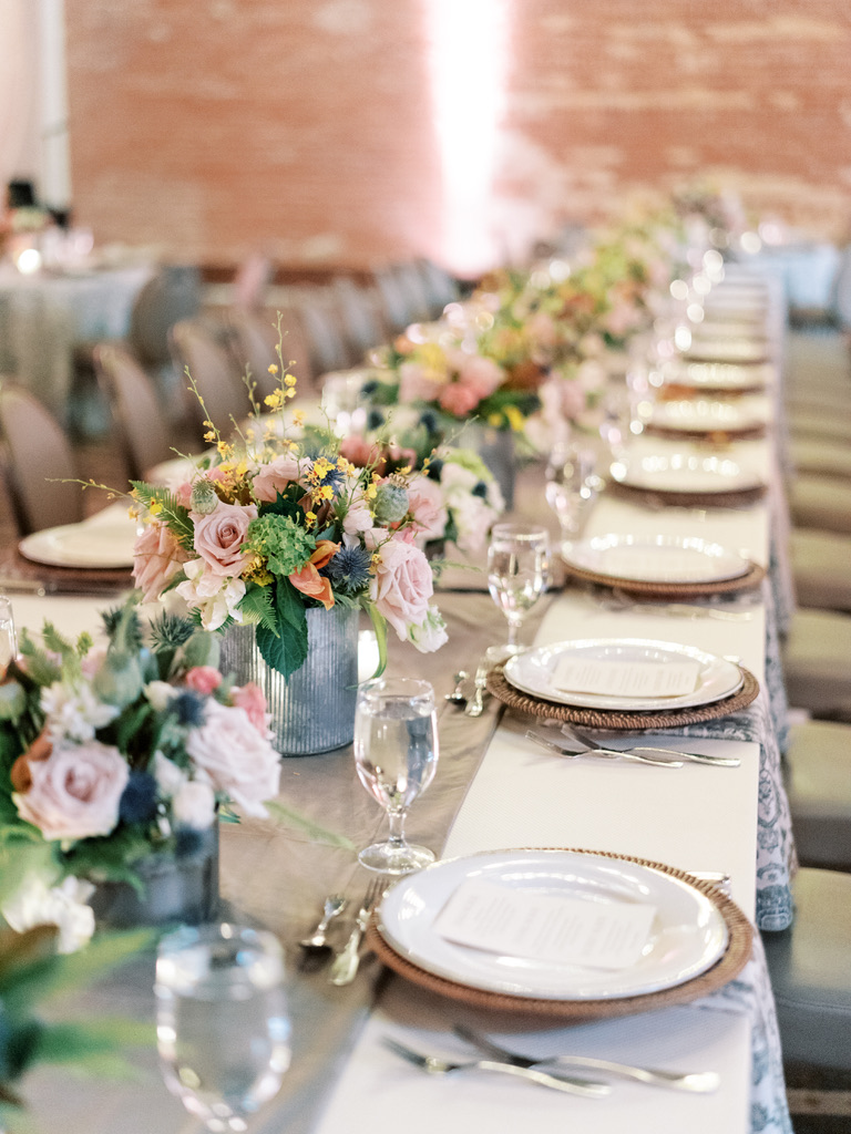 Elegant wedding reception table with pink and blush florals at a Central Texas wedding venue.