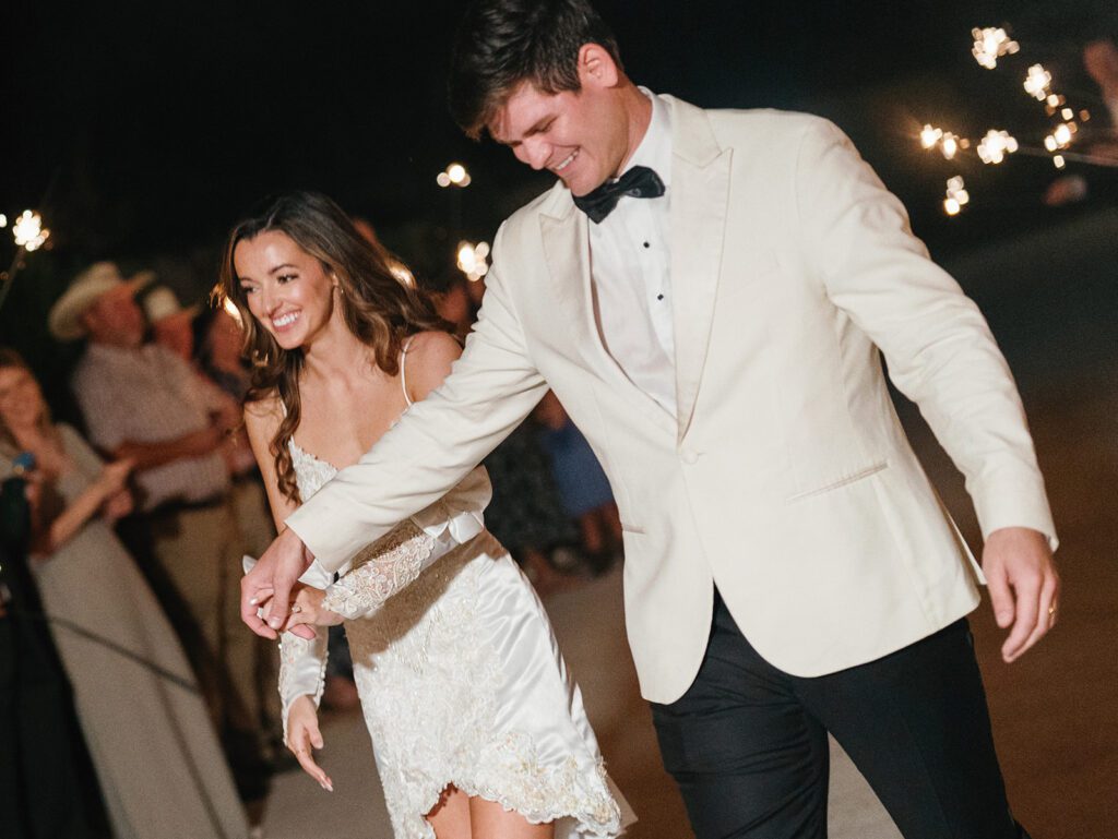 Hill Country couple enjoying a sparkler exit 