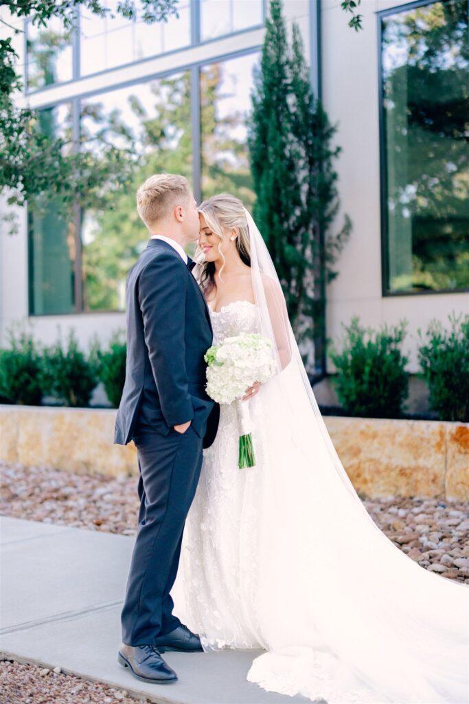 Bride and groom sharing a kiss