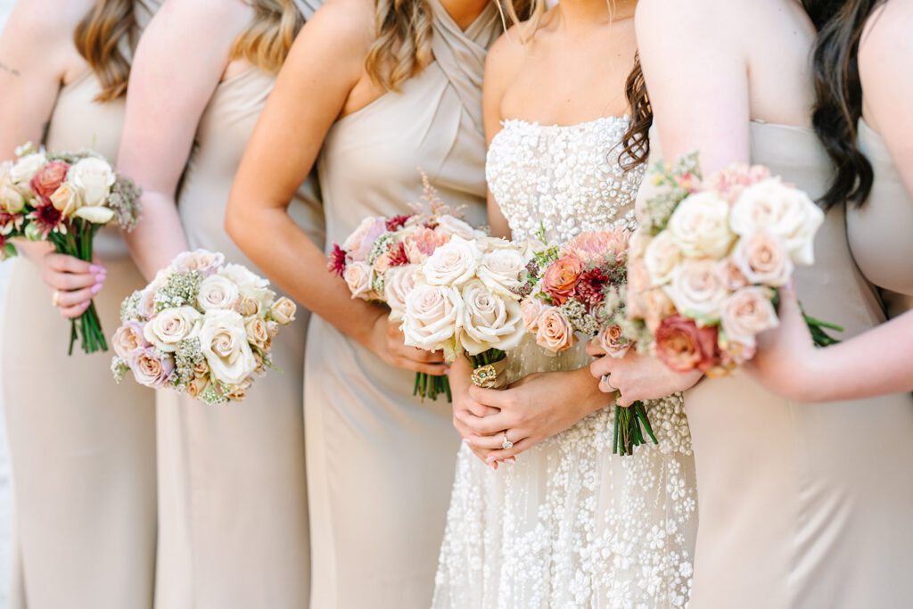 Bridal party holding beautiful bouquets, a perfect wedding decision