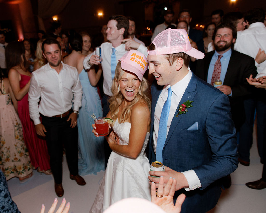 Happy couple dancing at reception thanks to their curated wedding vendor list