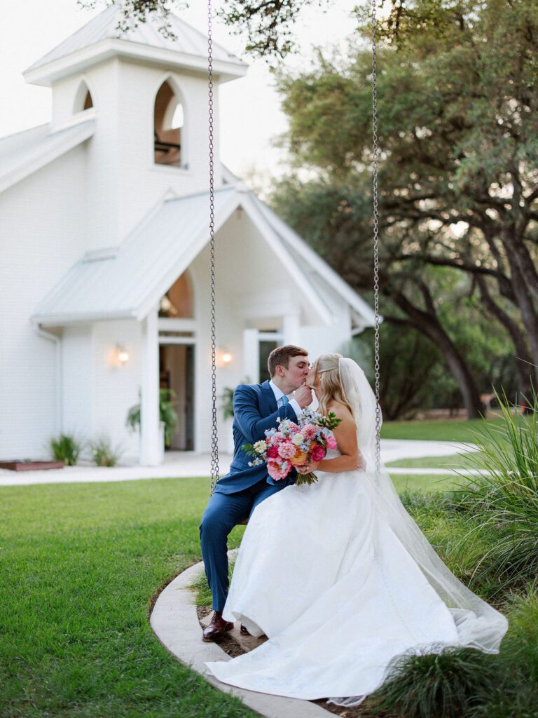 Newlyweds on swing