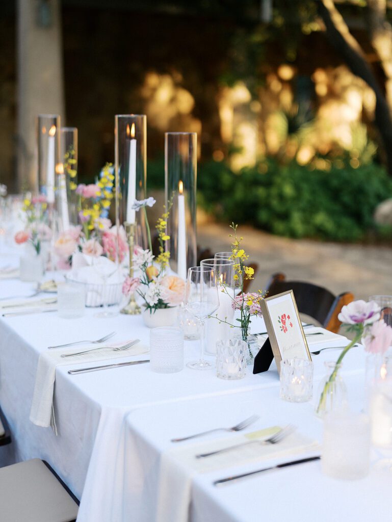 Outdoor wedding tablescape with candles