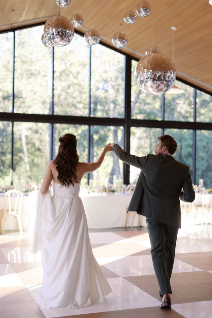 Couple dancing under disco balls