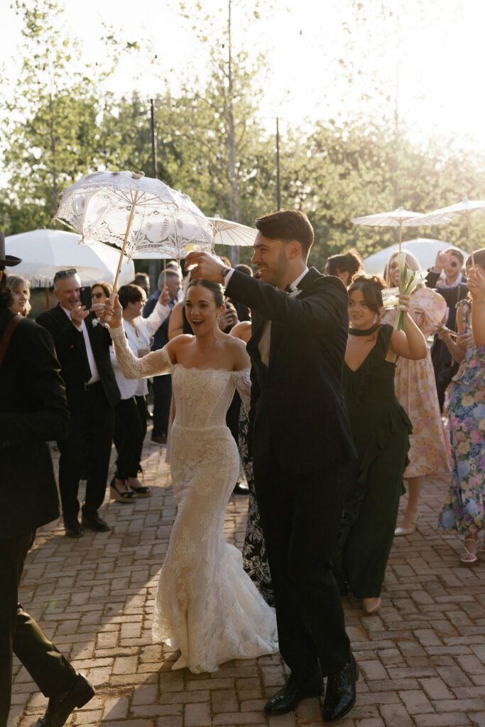 Bride and groom dancing in second line