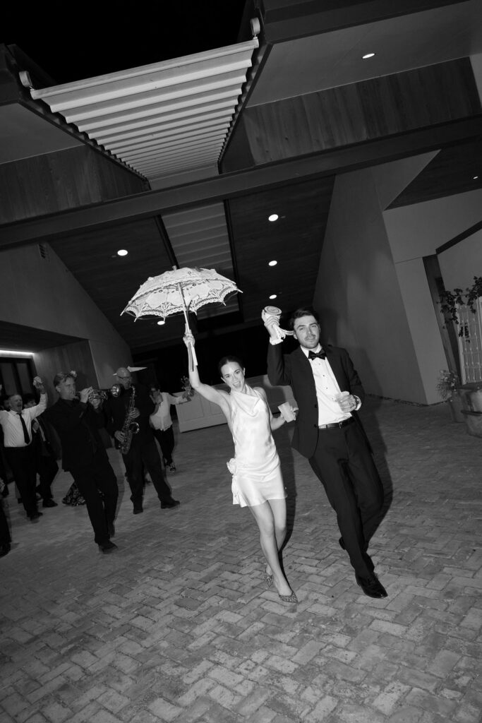 Bride and groom exit with second line