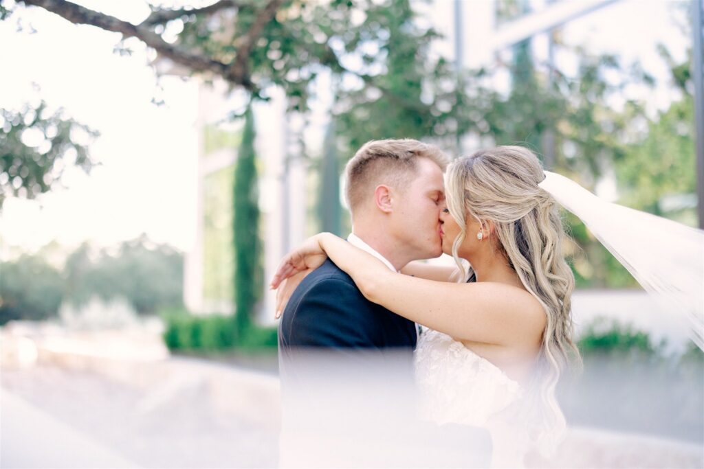 Close of up newlyweds who were happy they had someone to guide them through with a wedding budget breakdown