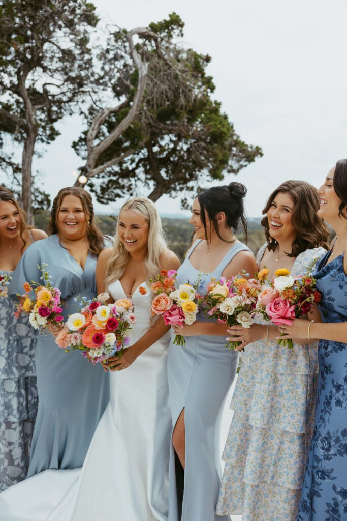 Colorful bouquets with bridal party