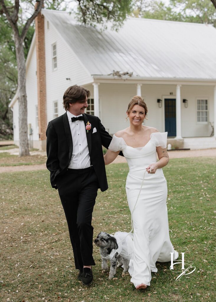 Newly married couple with their dog