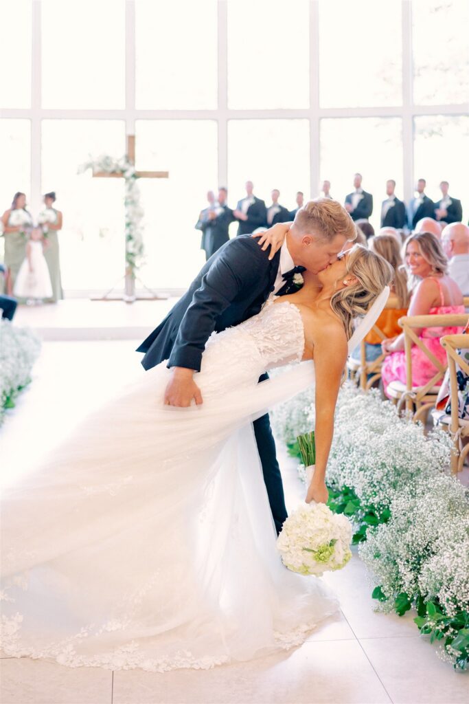 End of aisle dip kiss