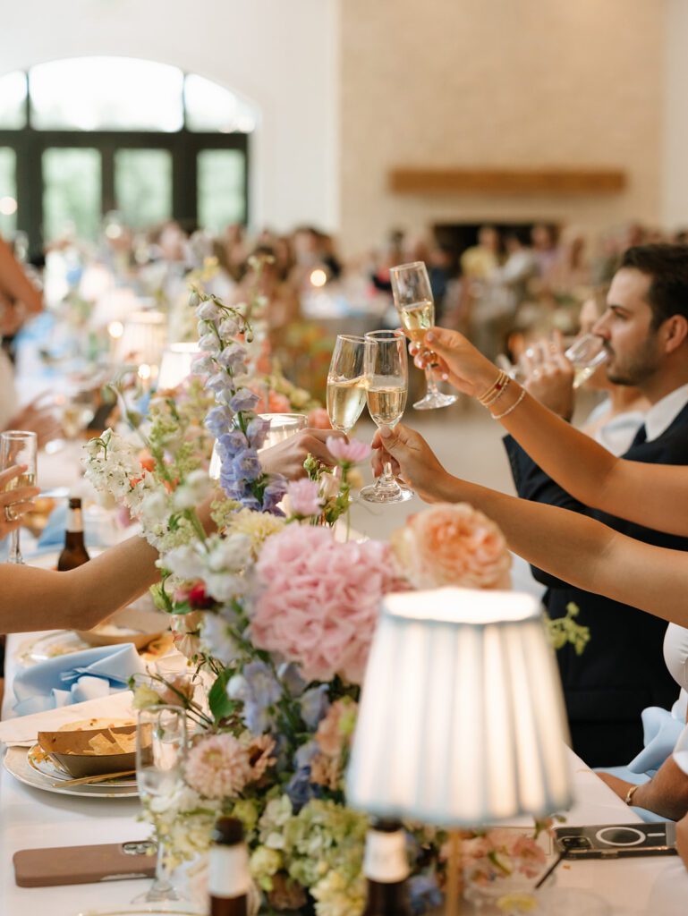 Champagne toasts at wedding reception