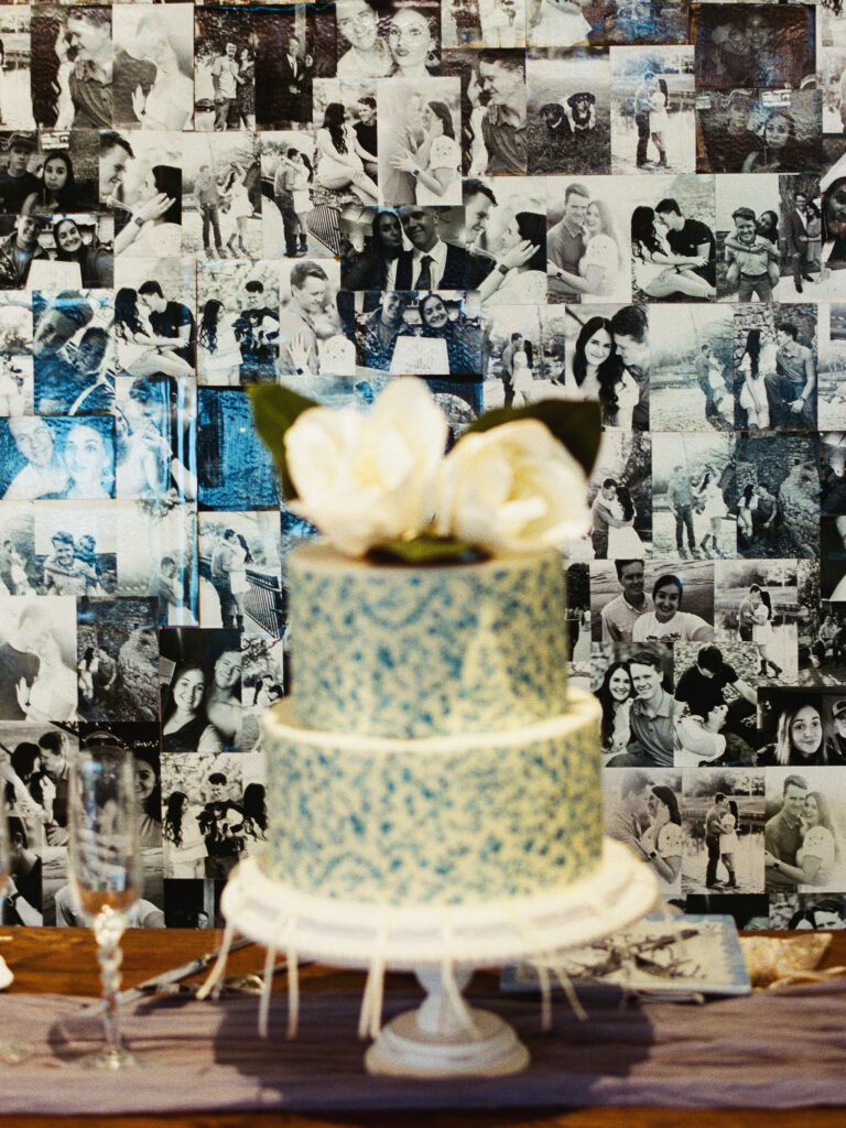 Couples collage of images behind wedding cake