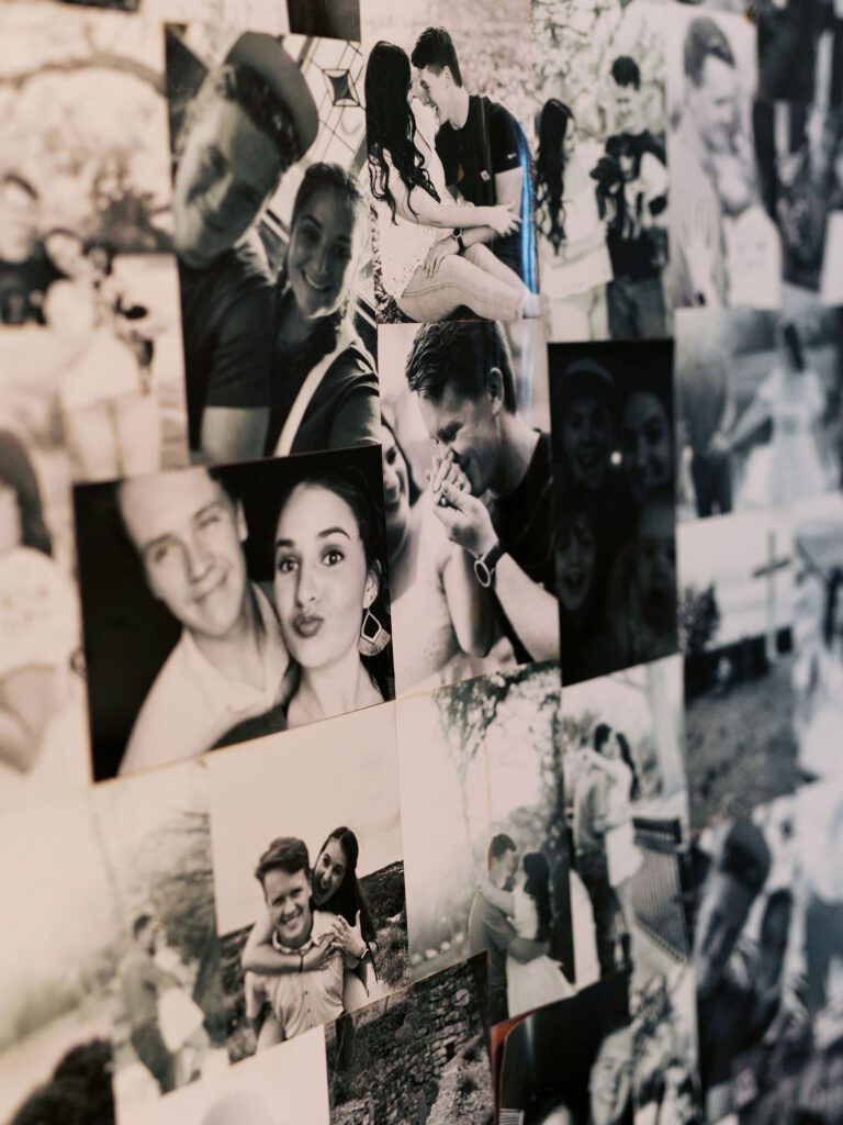 Photo collage on wall behind wedding cake