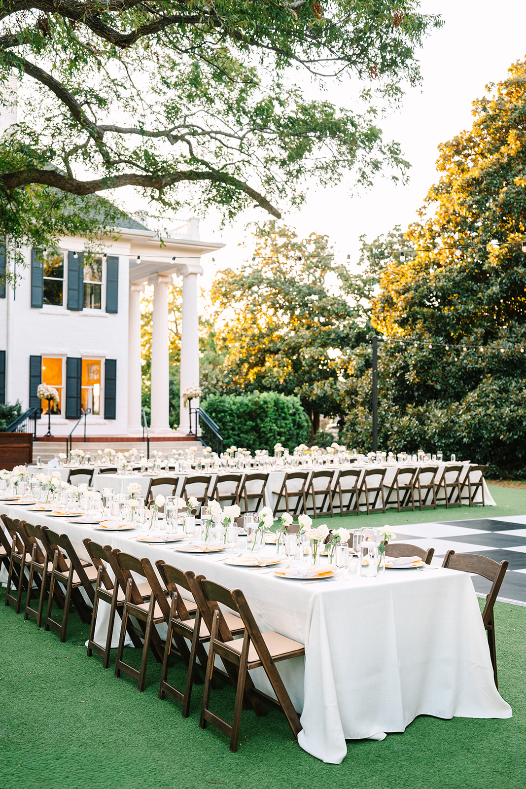 Wedding reception outside historic mansion